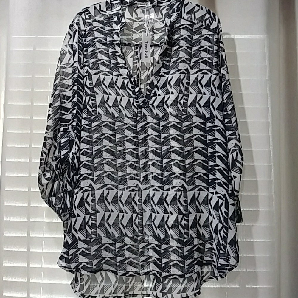 Brand new Flowy top with split neck